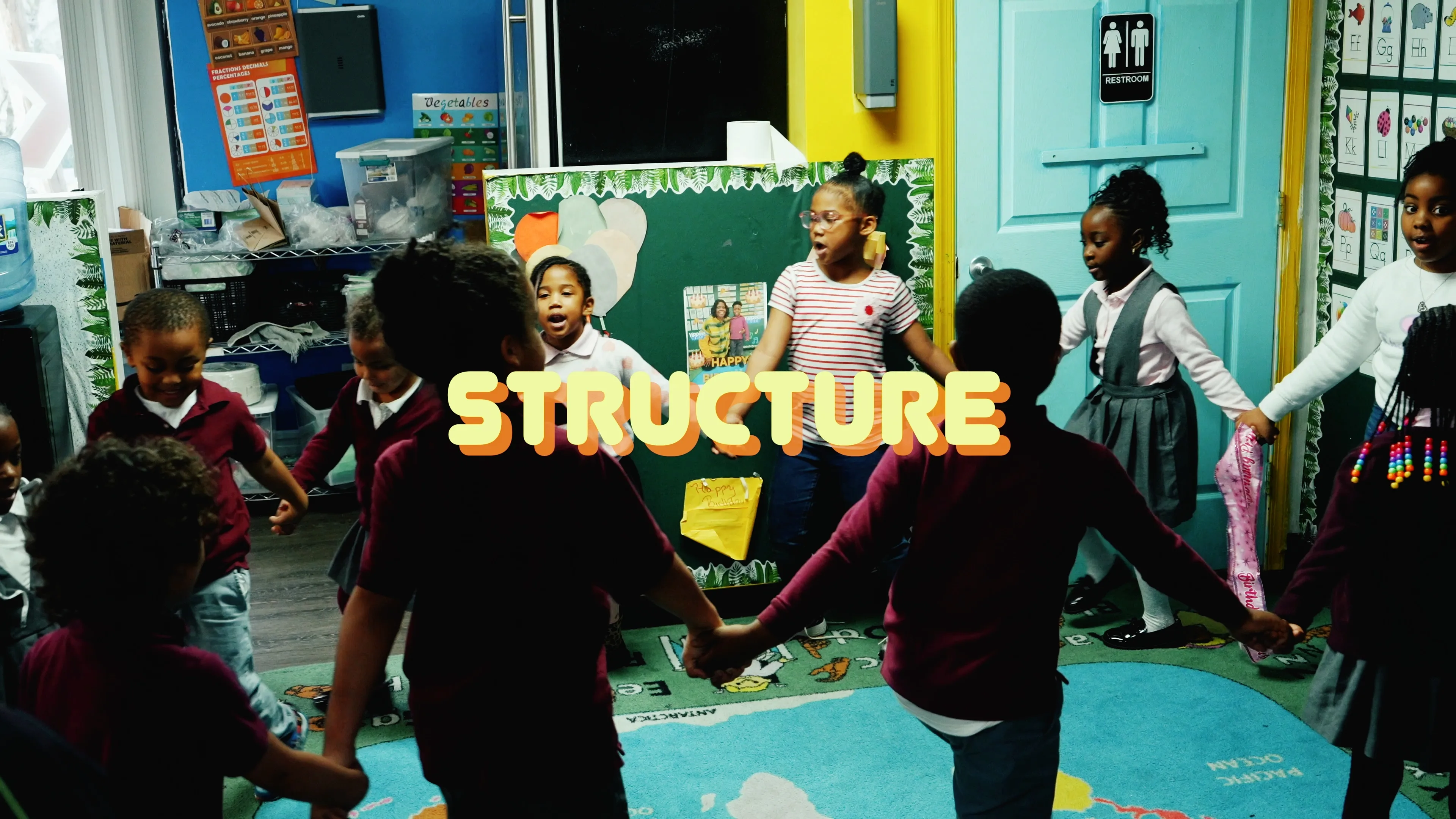 Children participating in a circle activity at Academy of Academics
