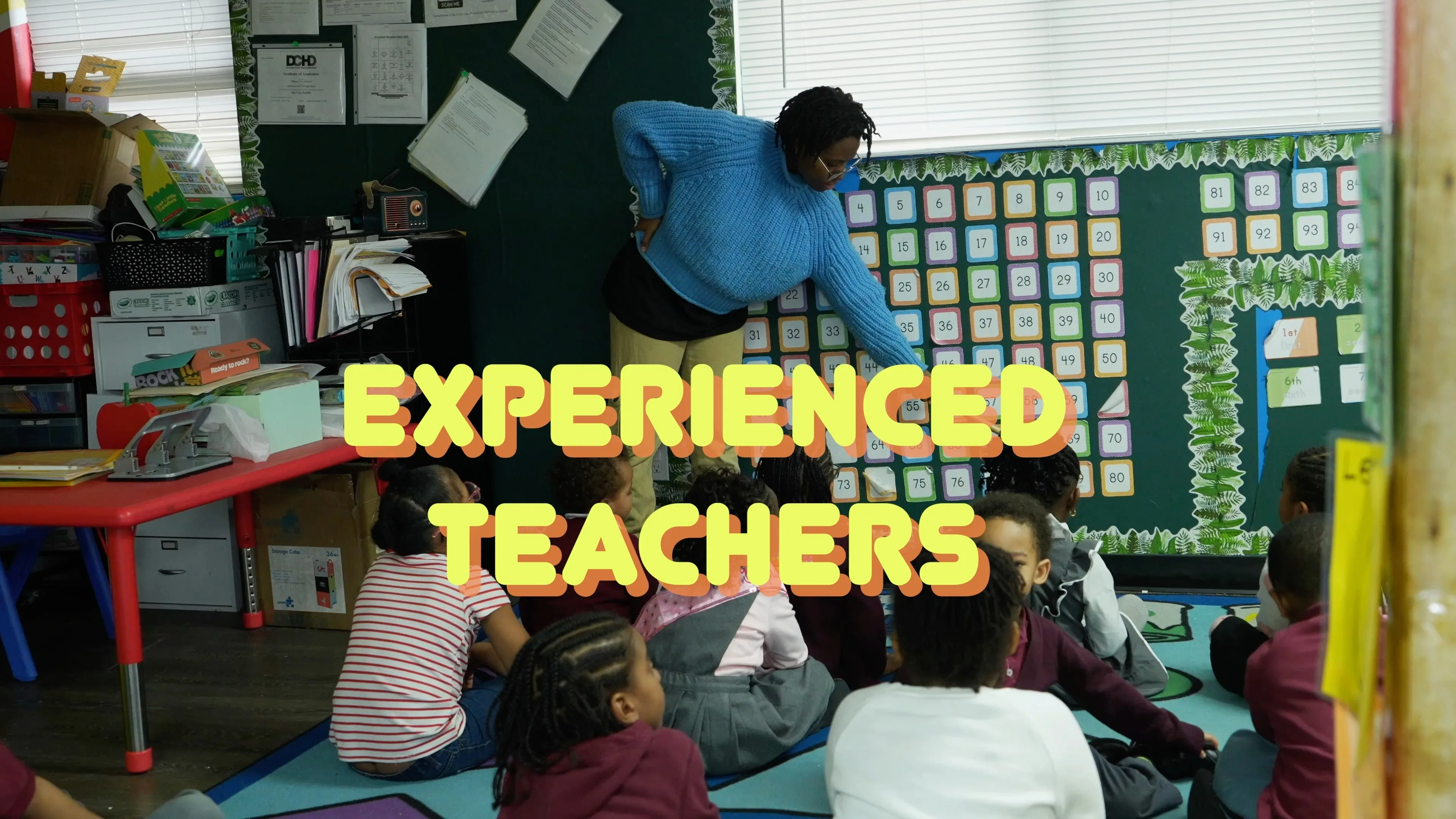 Experienced teacher leading a calendar lesson