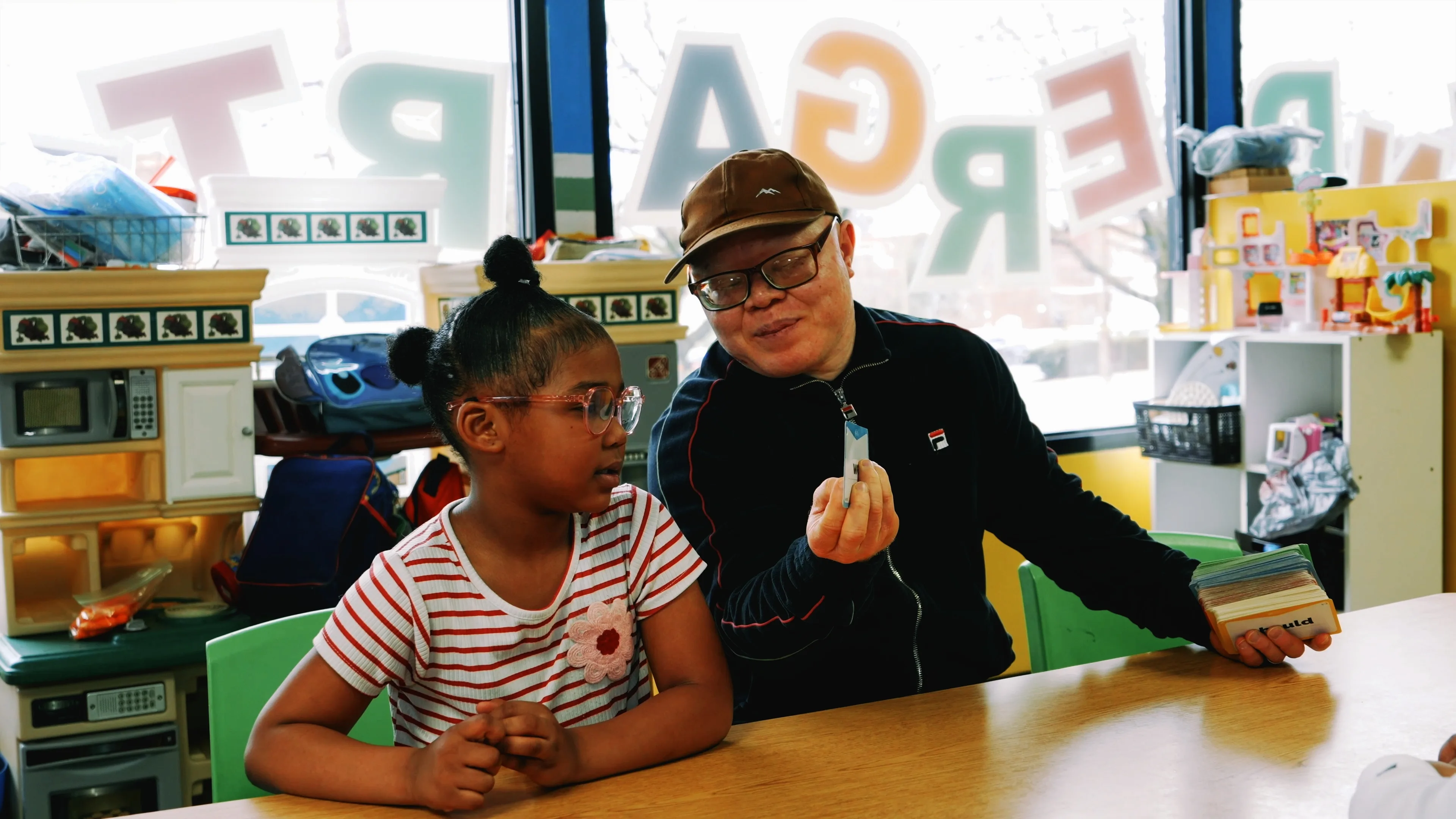 Student working one-on-one with a teacher